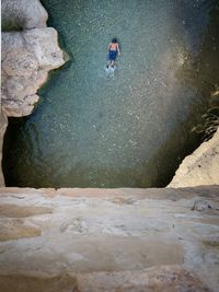 Man standing on rock