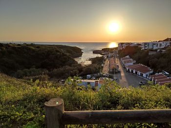 High angle view of sea against sky during sunset