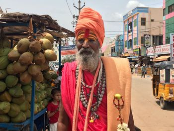 Man for sale at market stall