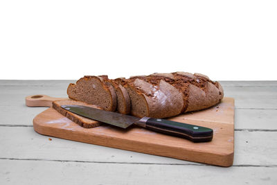 Close-up of bread on cutting board