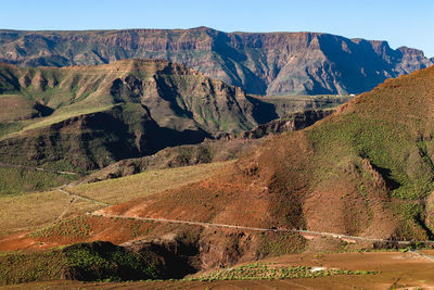 Scenic view of rocky mountains against sky