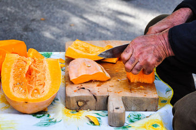 Close-up of man holding food