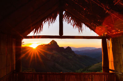 Beautiful sunset in the hut, baan huai hee - mae hong son province, thailand