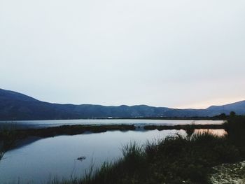 Scenic view of lake against clear sky