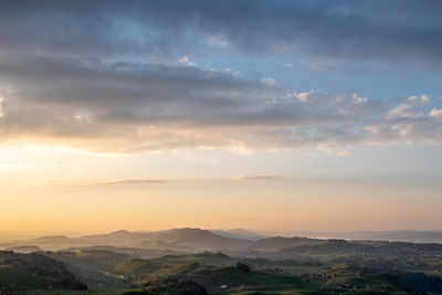 Evening mood over the gentle hills of the hirzel region in switzerland