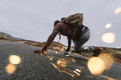 Man skateboarding on highway