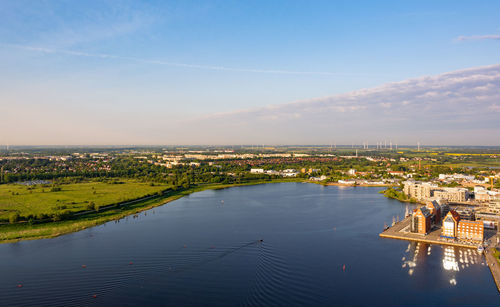 High angle view of river amidst buildings in city