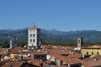 High angle view of church against blue sky