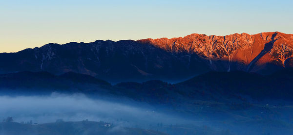 Scenic view of mountains against clear sky