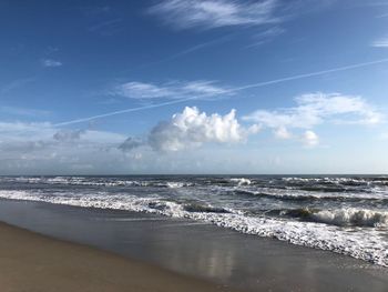 Scenic view of beach against sky