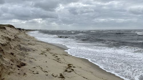 Scenic view of beach against sky