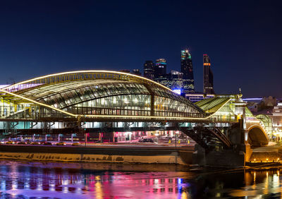 Night winter panorama of the moskva river embankment - skyscrapers of moscow