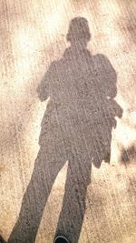 Shadow of man on wall