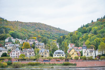 Houses and buildings against sky