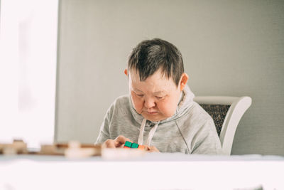 Empowering development through play, elderly woman with down syndrome explores new horizons