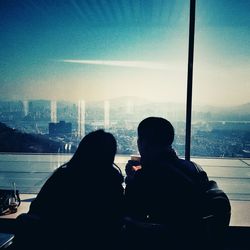 Man looking at cityscape