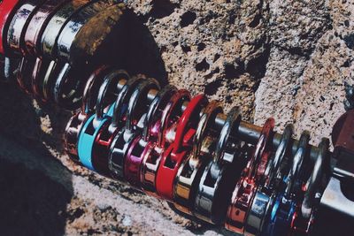 High angle view of bottles on rock