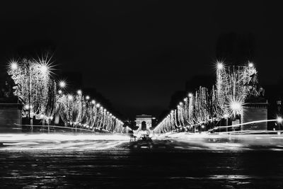 Illuminated street lights at night