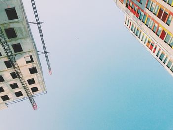 Low angle view of building against blue sky