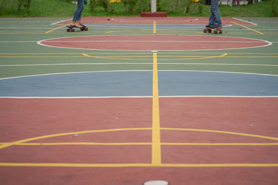 Low section of people skateboarding