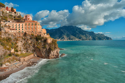 Amalfi coast, scenic view of sea against cloudy sky