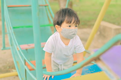 Boy playing in playground