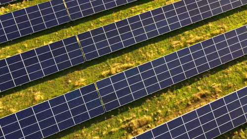 Aerial drone view flight over solar power station panels. aerial top view of solar farm. 