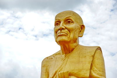 Low angle view of statue against sky