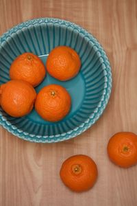 Close-up of orange fruits on table