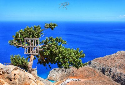 Scenic view of sea against blue sky