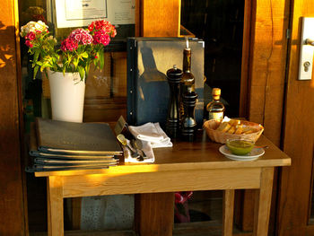 Food with files and vase on table