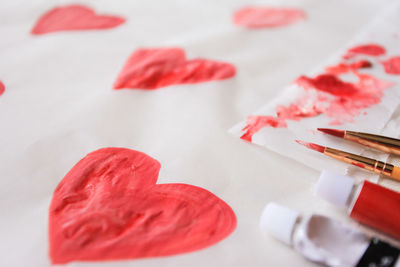 Close-up of heart shaped paper on table