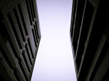 Low angle view of buildings against clear sky