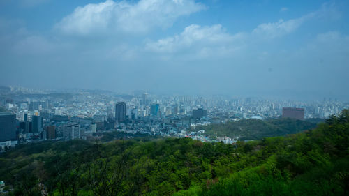 High angle view of buildings against sky