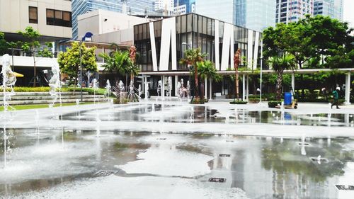 Fountain with buildings in background