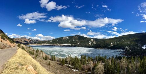Scenic view of lake against blue sky