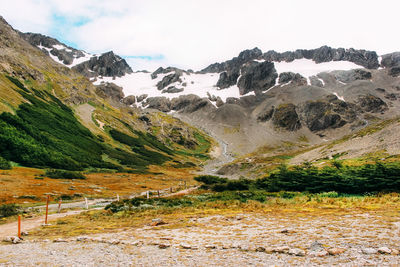 Scenic view of snowcapped mountains against sky