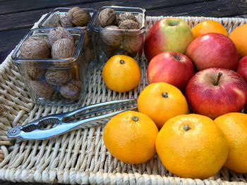 Close-up of fruits in basket on table