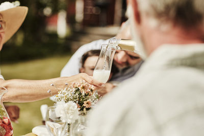 Close-up of a man drinking glass