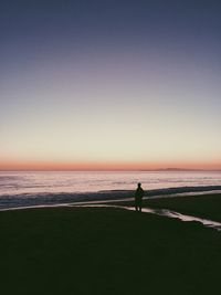 Scenic view of sea at sunset