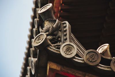 Close-up of sculpture temple japan