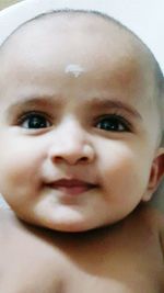 Close-up portrait of smiling boy