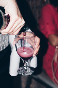 Close-up of hand holding drink