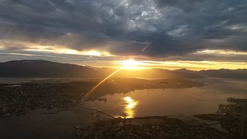 Scenic view of sunset over city