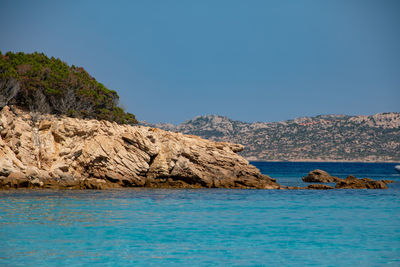 Scenic view of sea against clear blue sky