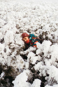 Full length of woman skiing on snow