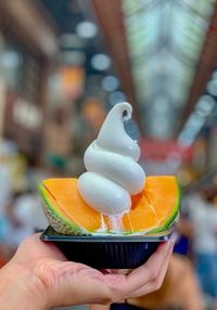 Close-up of person holding ice cream cone