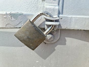 Close-up of padlock on wall