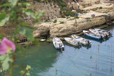 High angle view of boats moored in river