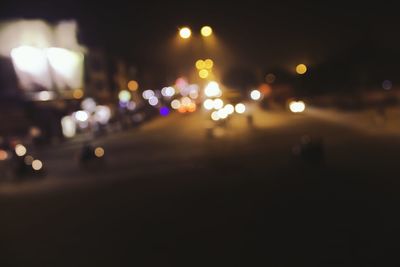 Illuminated street lights at night